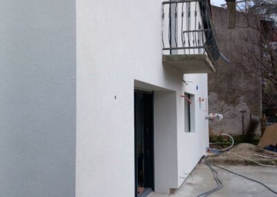 Maison avec isolation en fibre de bois avec finition RPE
