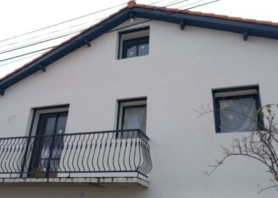 Maison avec isolation en fibre de bois avec finition RPEIM